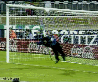 Goalscoring goalkeeper and resident nutter Higuita, does the scorpion against England.